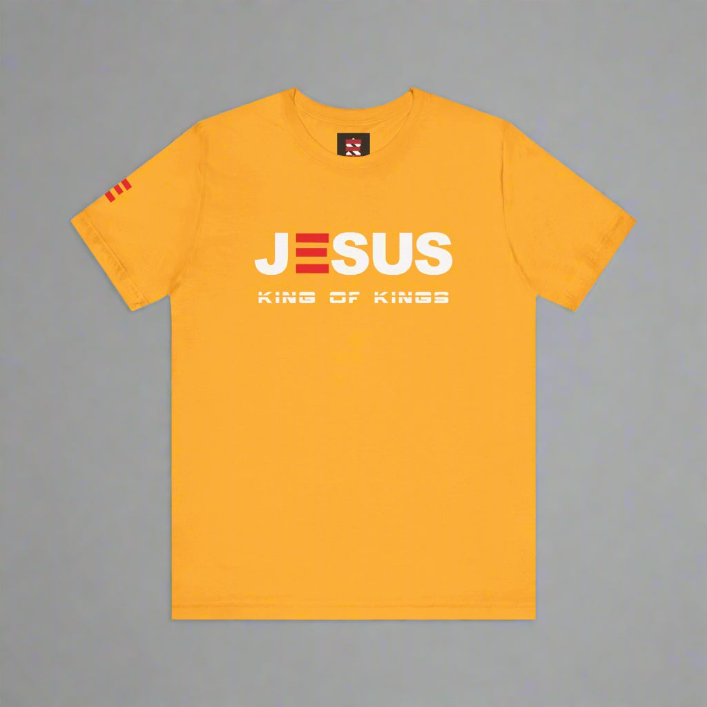 Gold t-shirt with 'Jesus King of Kings' text on a gray background