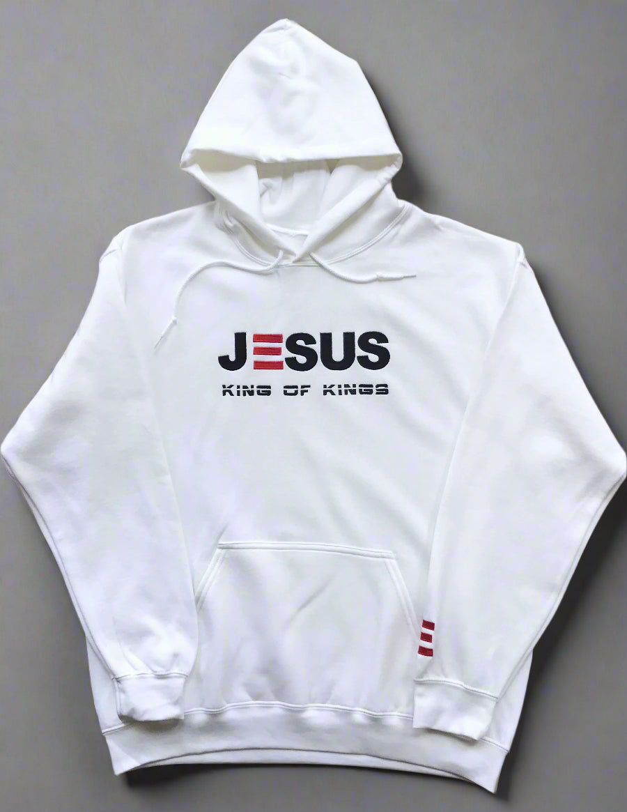 White hoodie with 'Jesus King of Kings' text on a grey background
