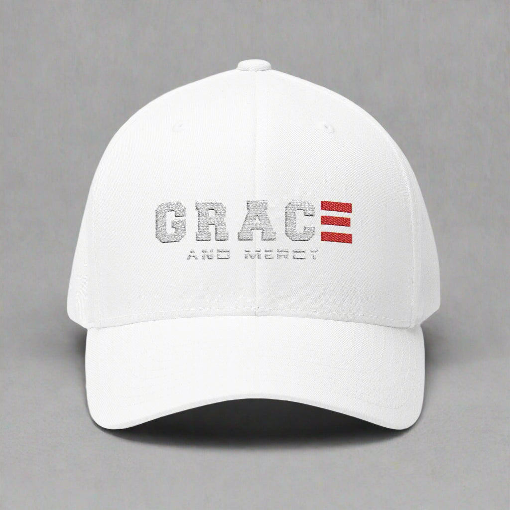White cap with 'GRACE AND MERCY' text and red logo design on a grey background