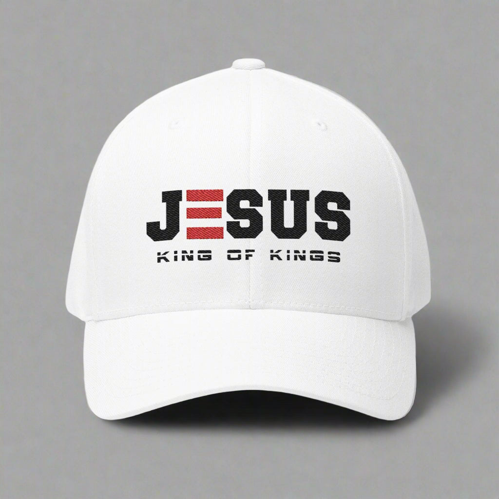 White cap with 'Jesus King of Kings' text on a gray background