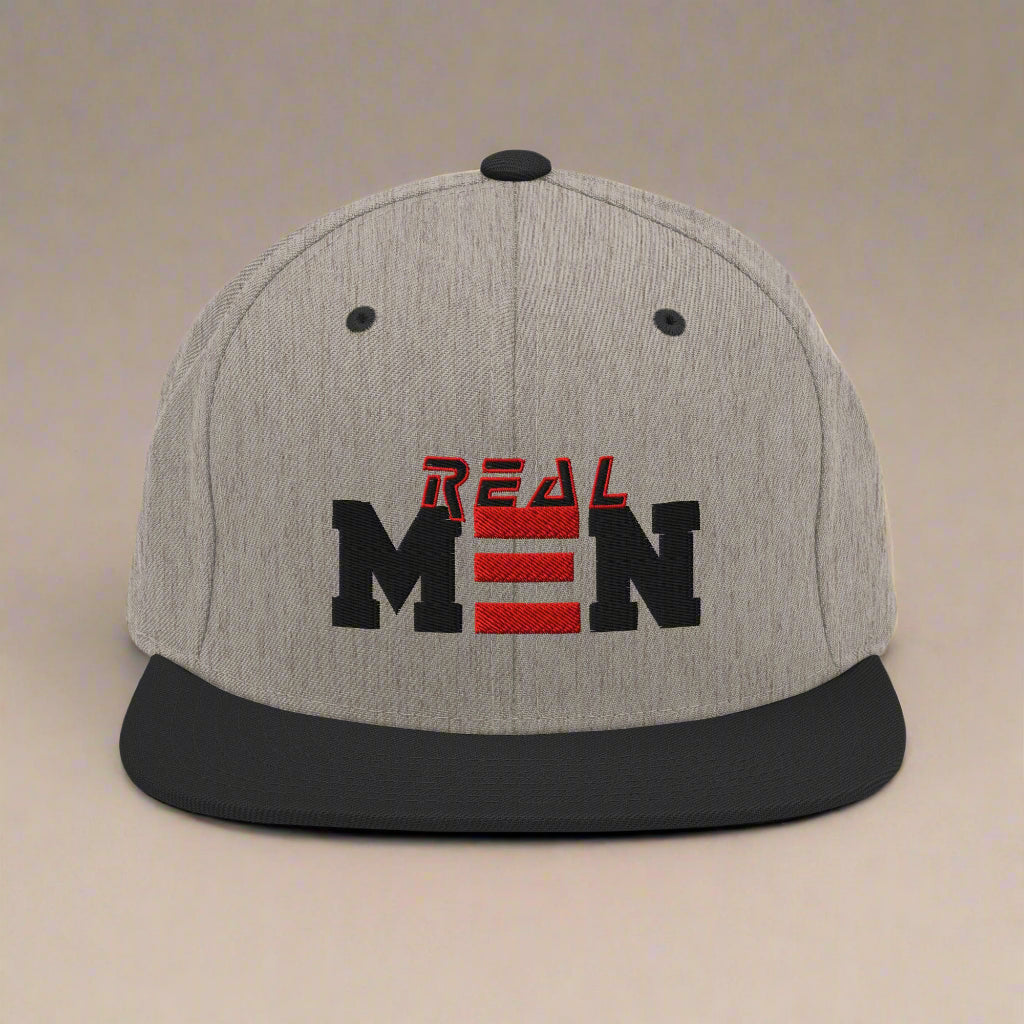 tan and black cap with 'REAL MEN' text on a white background