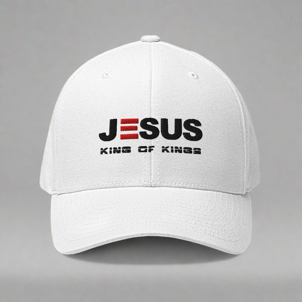 White cap with 'JESUS KING OF KINGS' text on a gray background