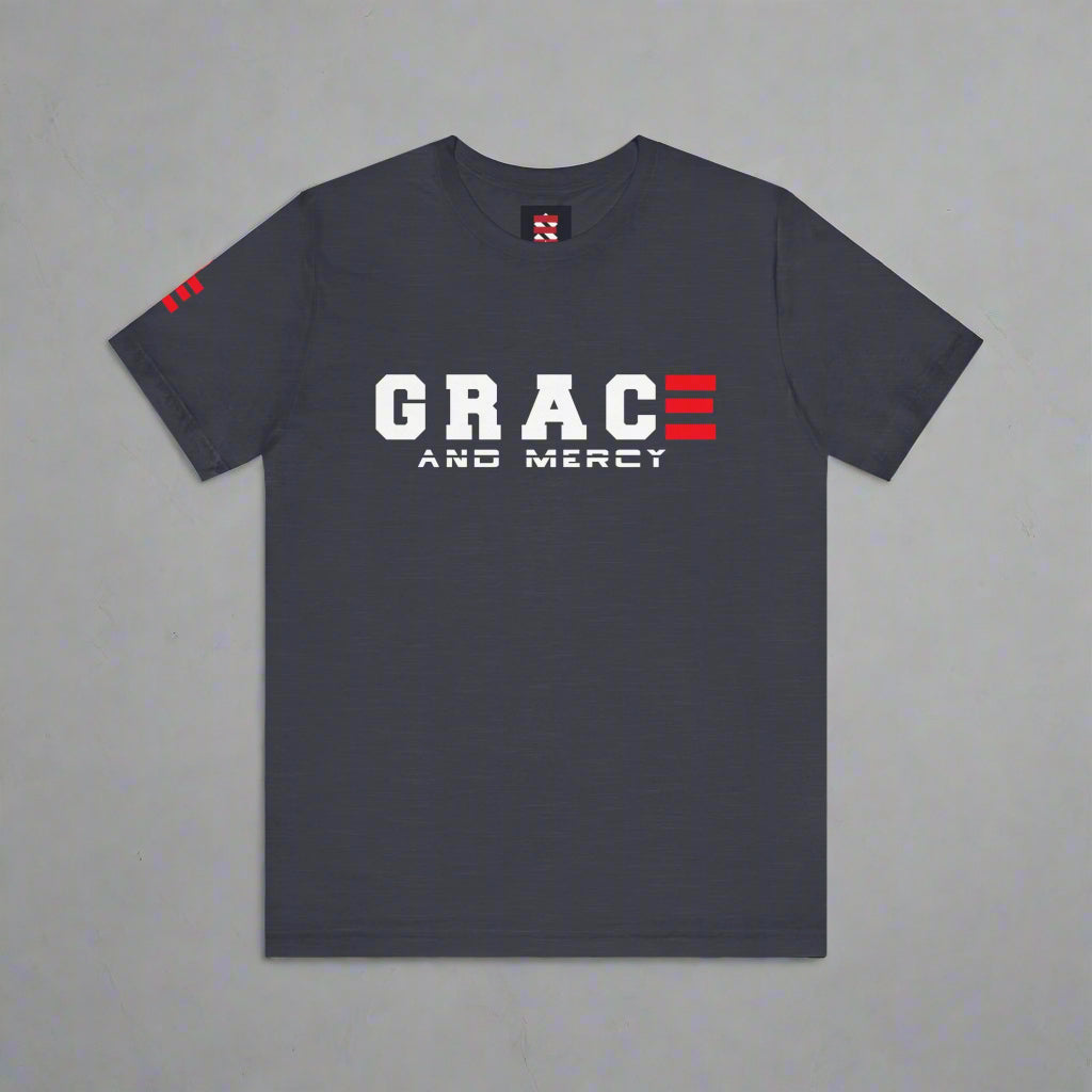 Heather Midnight Navy blue t-shirt with 'GRACE AND MERCY' text and red and white design on a gray background