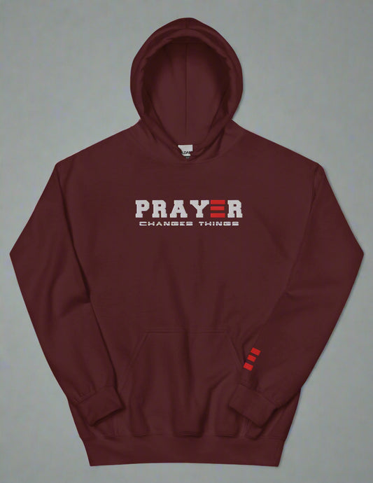 Maroon hoodie with 'PRAYER CHANGES THINGS' text on a white background