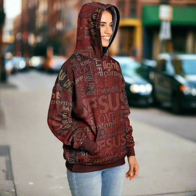 Jesus Passion Heavyweight Oversized Hoodie in brown with graphic design. Light female side with hood on.