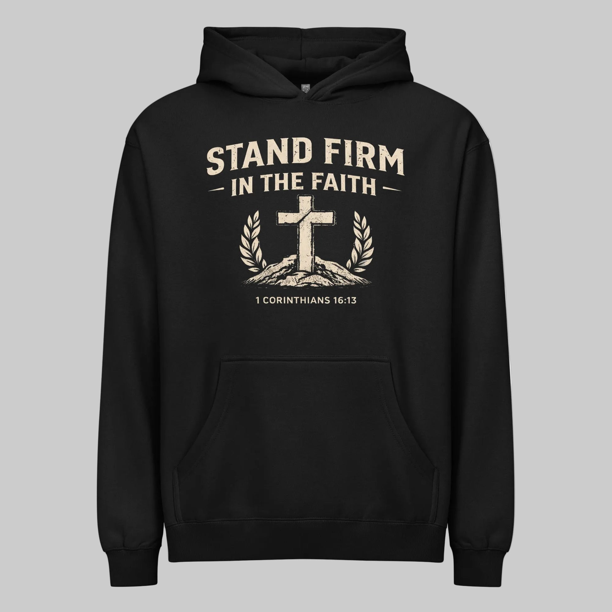 Black hoodie with 'Stand Firm in the Faith' text and cross design on a gray background