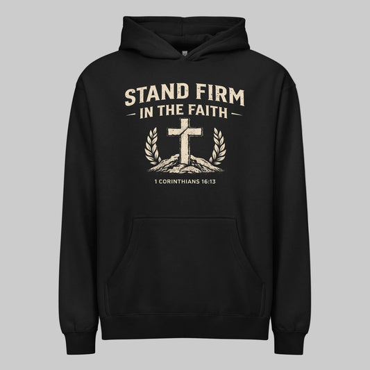 Black hoodie with 'Stand Firm in the Faith' text and cross design on a gray background