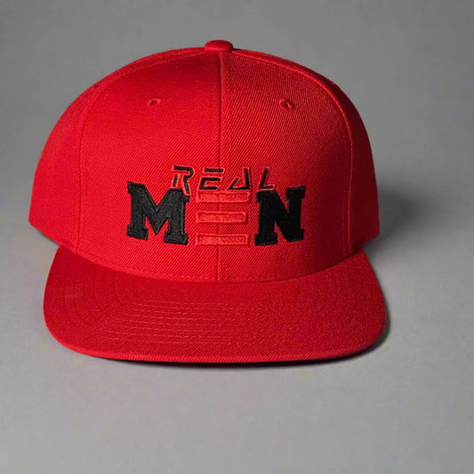 Red cap with black text on a light-colored surface