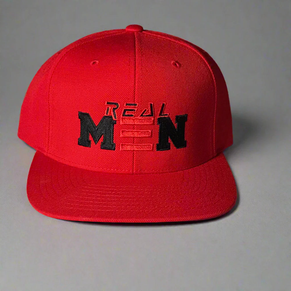 Red cap with black text on a light-colored surface