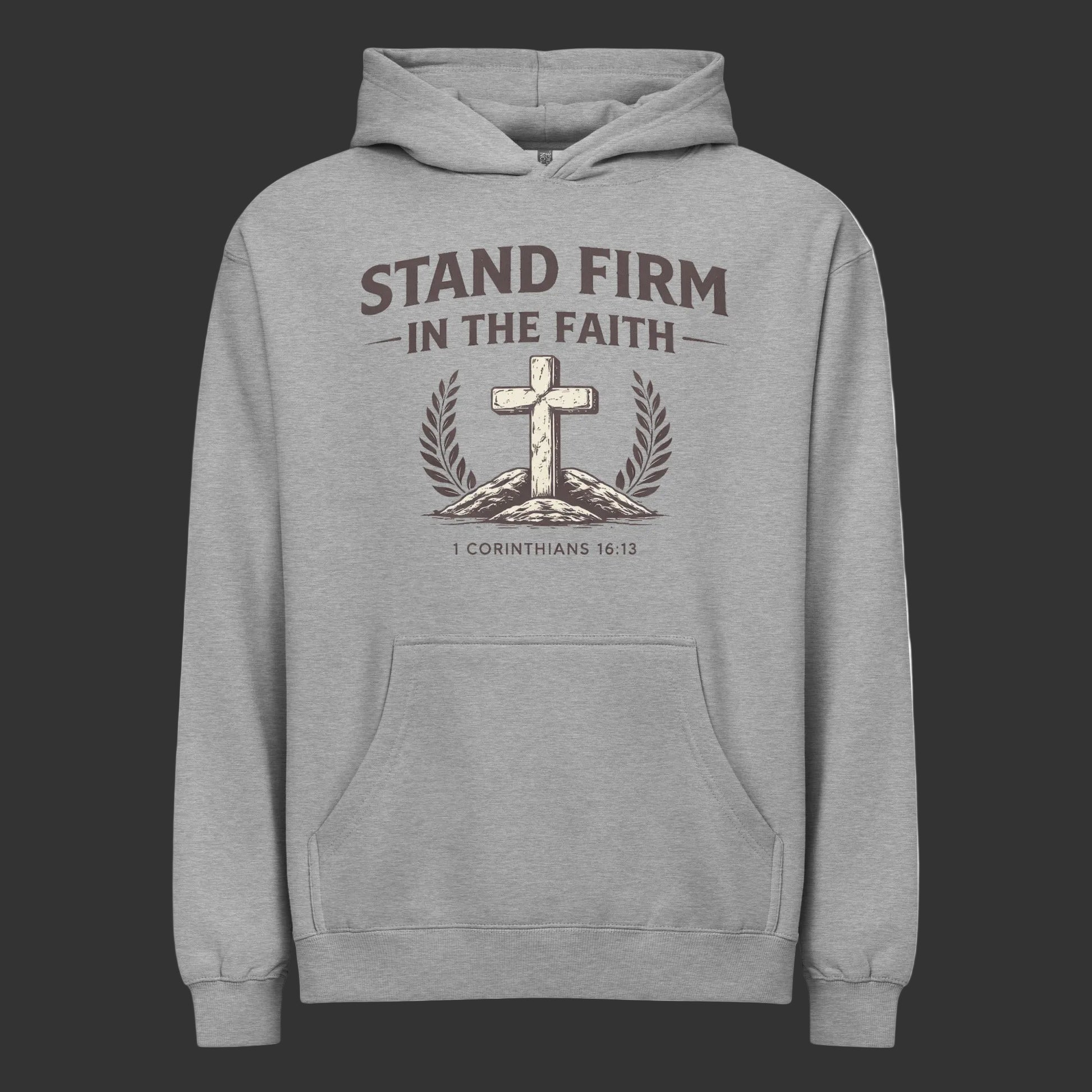 Gray hoodie with cross and laurel wreath design and text 'Stand Firm in the Faith' on a black background