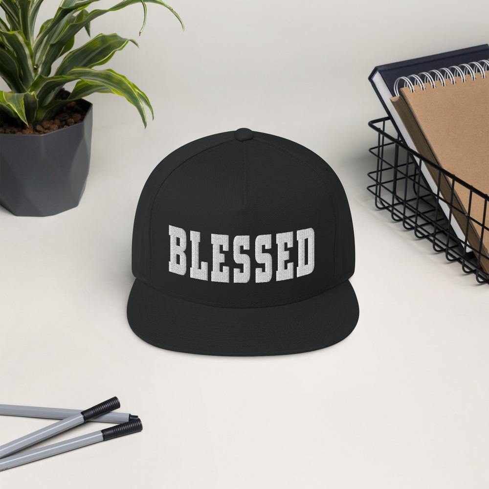 Blessed Flat Bill Cap - black on table